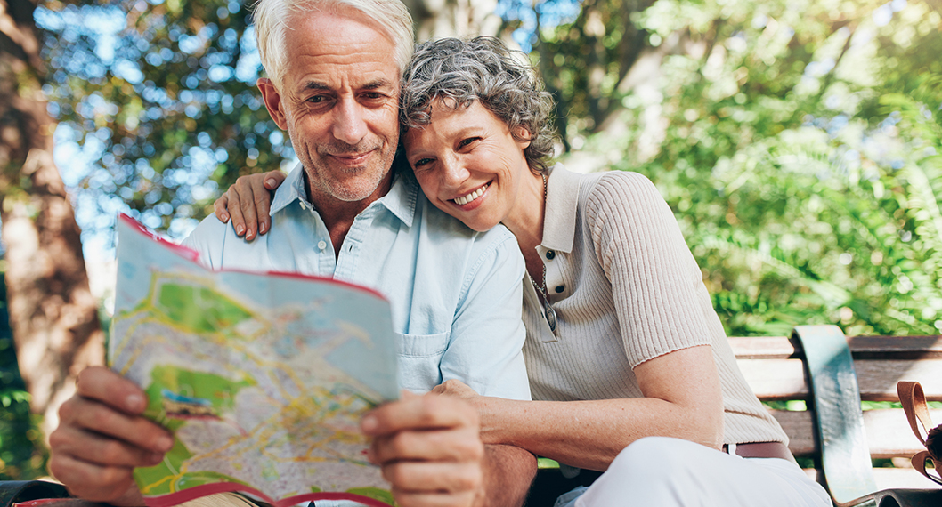 Retired couple reading about what Medicare Part C is 